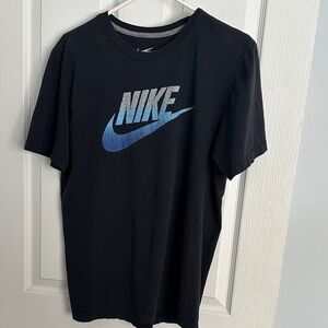 Nike Men's Black Tee with Blue Logo
